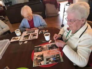 two assisted living residents doing activity together