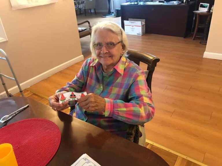 assisted living resident doing a craft