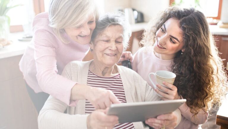 A teenage girl with mother and grandmother at home.